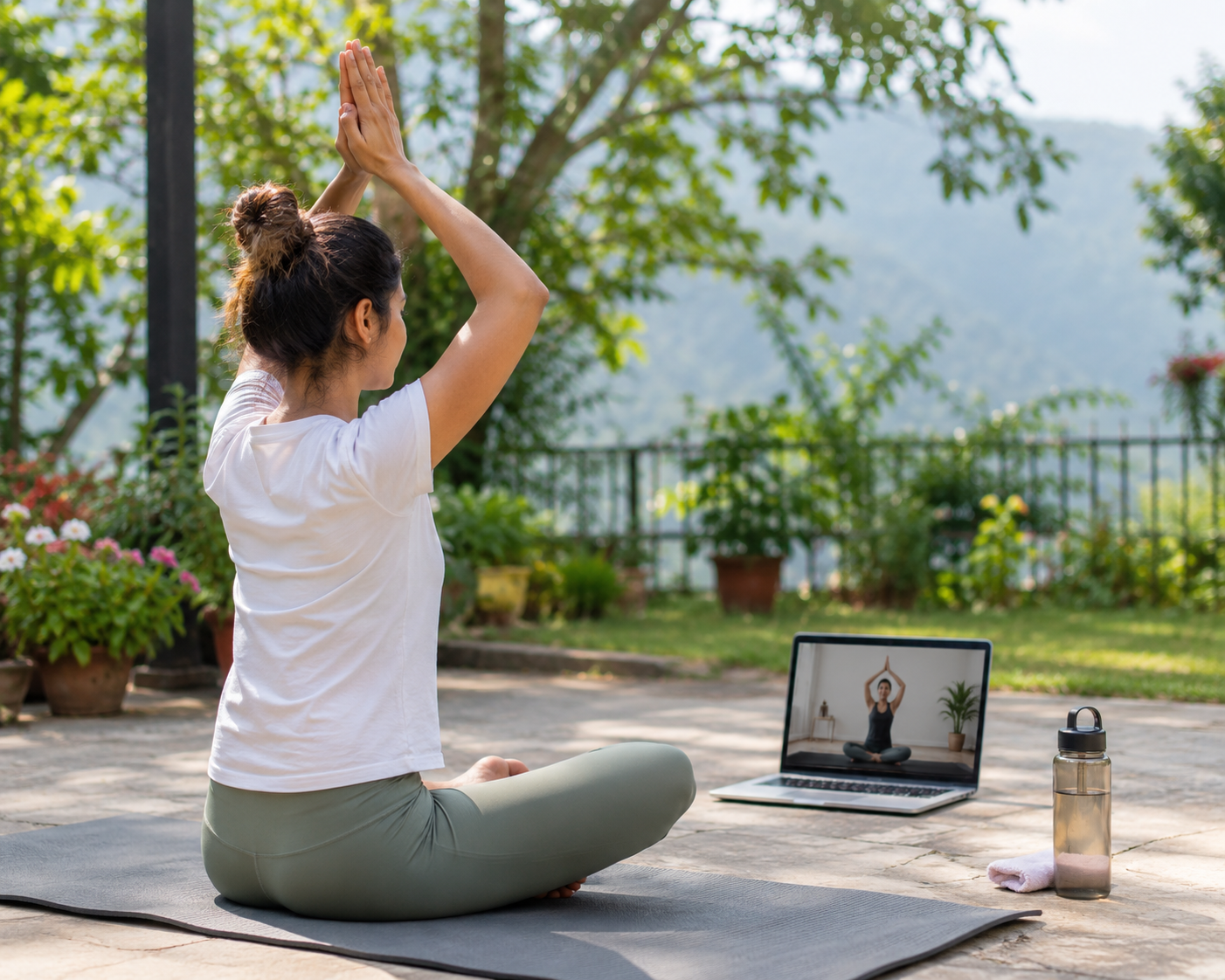 Woman practicing yoga at home online